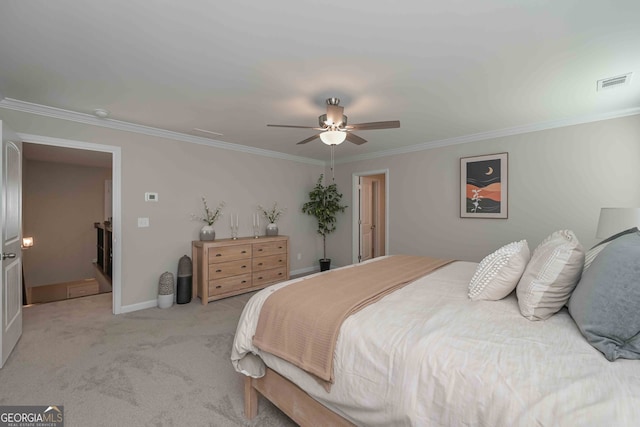 carpeted bedroom featuring ceiling fan and crown molding