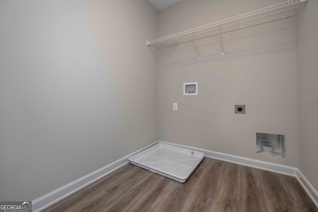 washroom featuring hookup for a washing machine, hookup for an electric dryer, and dark wood-type flooring