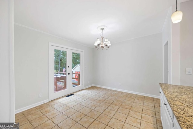 unfurnished dining area featuring french doors, crown molding, light tile patterned floors, and a chandelier