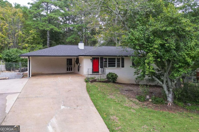 single story home with a carport