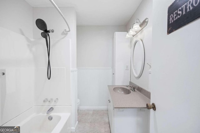 full bathroom with shower / washtub combination, vanity, and toilet