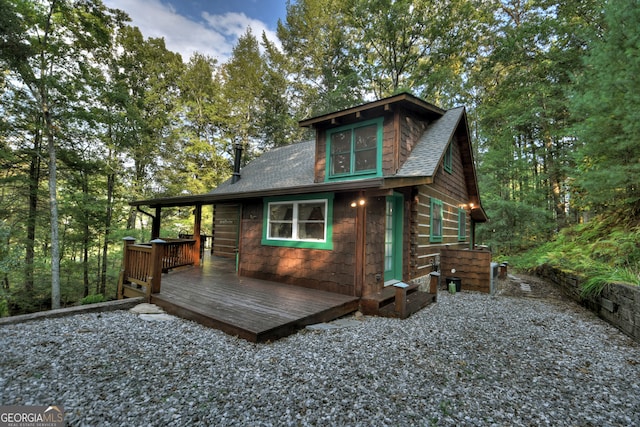 view of front of house with a deck