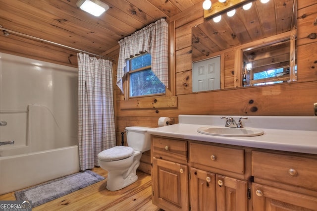 full bathroom featuring vanity, wooden walls, shower / bathtub combination with curtain, wooden ceiling, and toilet