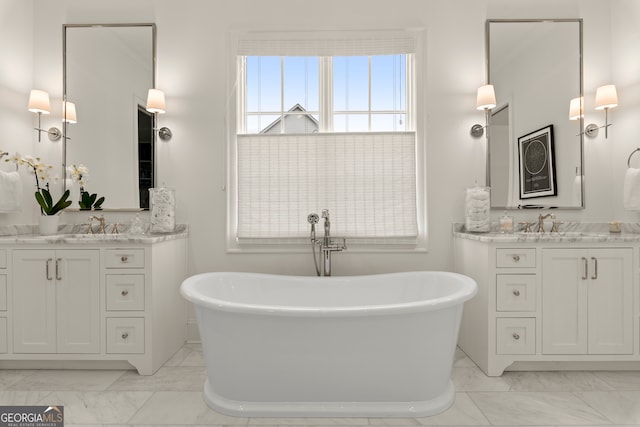 bathroom with a bathing tub and vanity