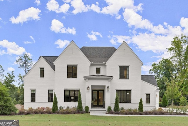 view of front of home with a front lawn