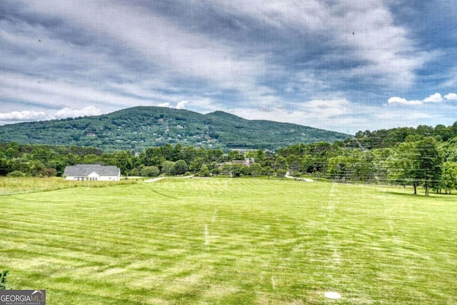 view of mountain feature featuring a rural view