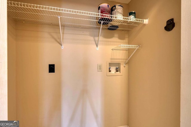 clothes washing area with electric dryer hookup and hookup for a washing machine