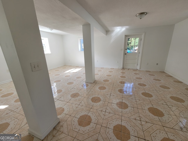 interior space featuring light tile patterned floors