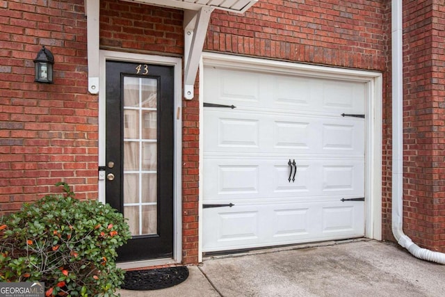 entrance to property featuring a garage