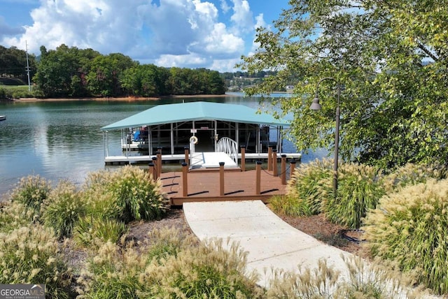 view of front of house featuring a boat dock and a water view