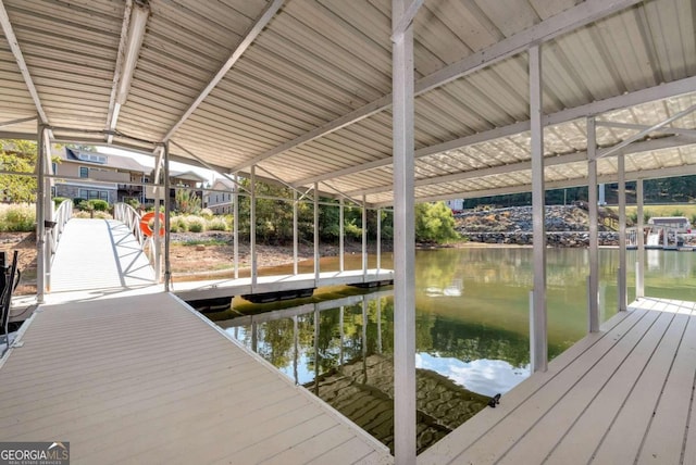 view of dock with a water view