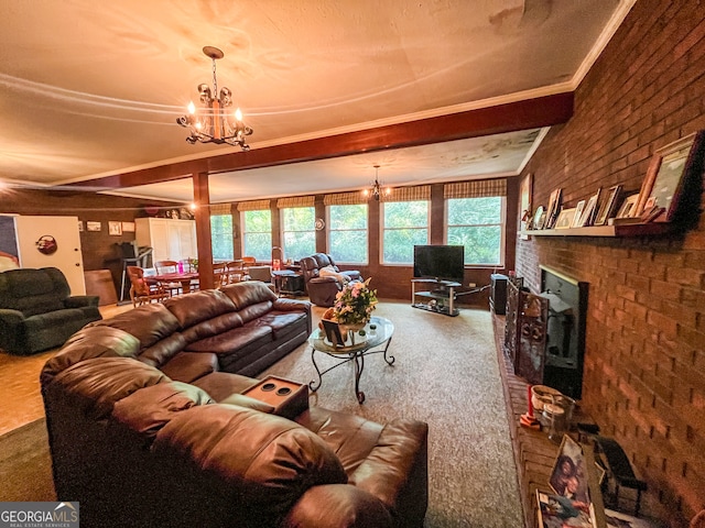 living room with an inviting chandelier, a brick fireplace, carpet, and brick wall