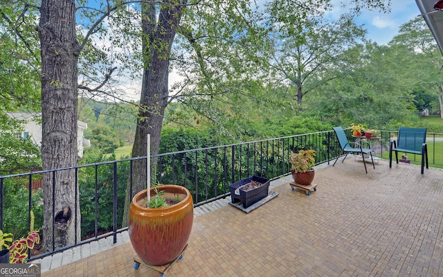 view of patio / terrace with a balcony