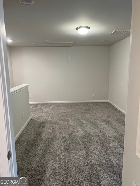 spare room with carpet flooring