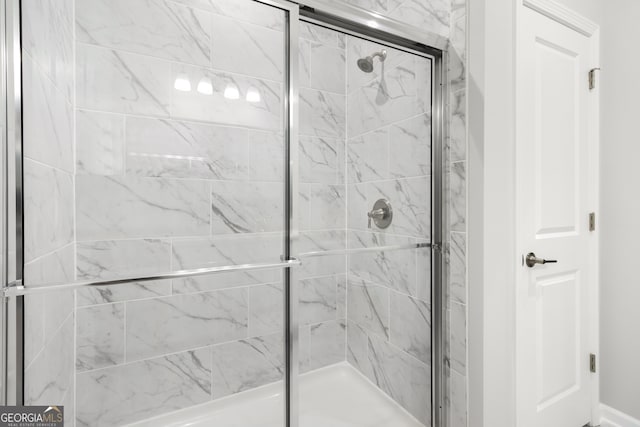 bathroom with an enclosed shower