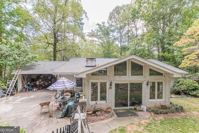 rear view of house featuring a patio