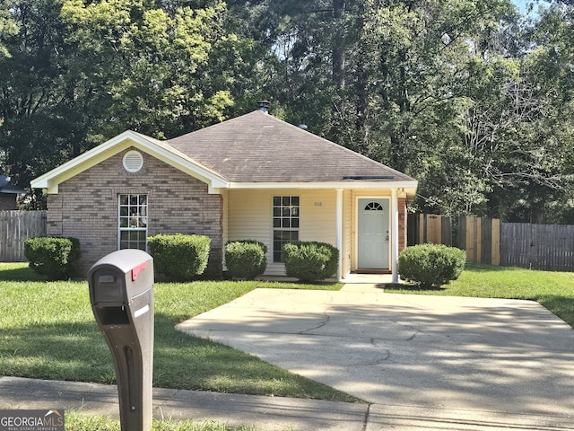 view of front of home with a front yard