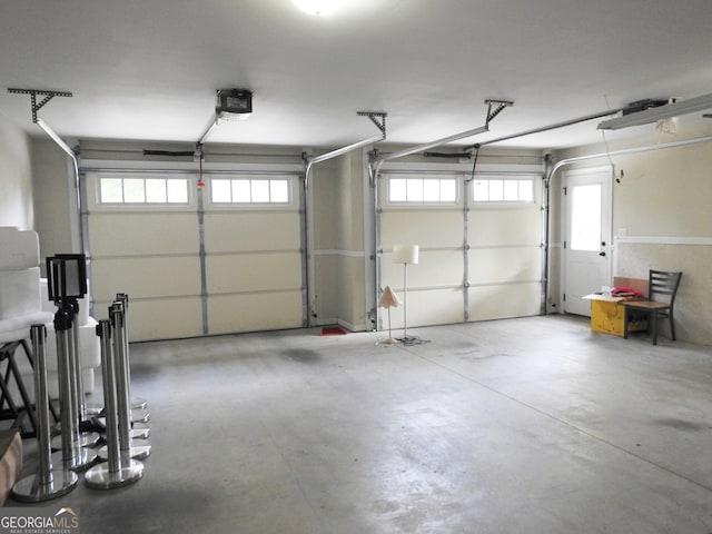 garage featuring a garage door opener