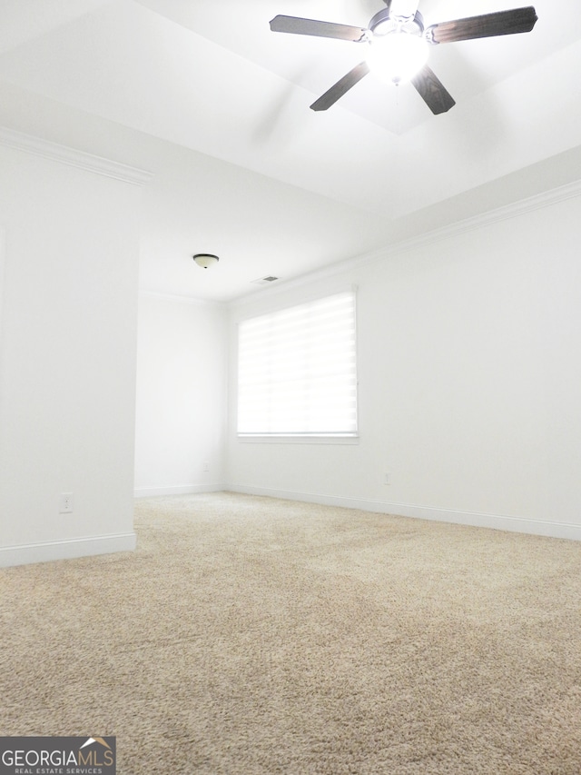 unfurnished room with carpet floors and ceiling fan