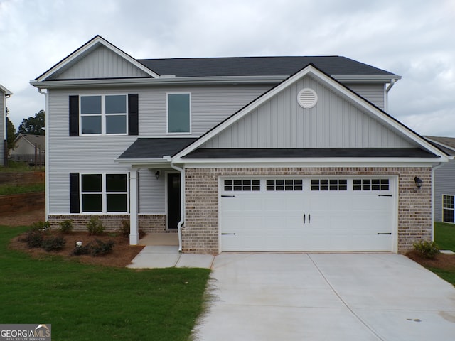 craftsman inspired home with a front yard