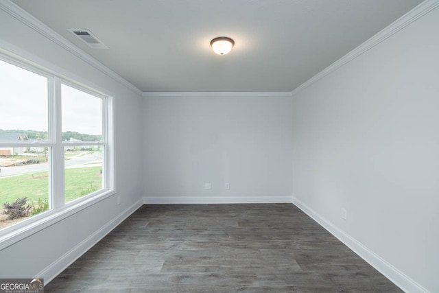 unfurnished room with crown molding and dark hardwood / wood-style flooring