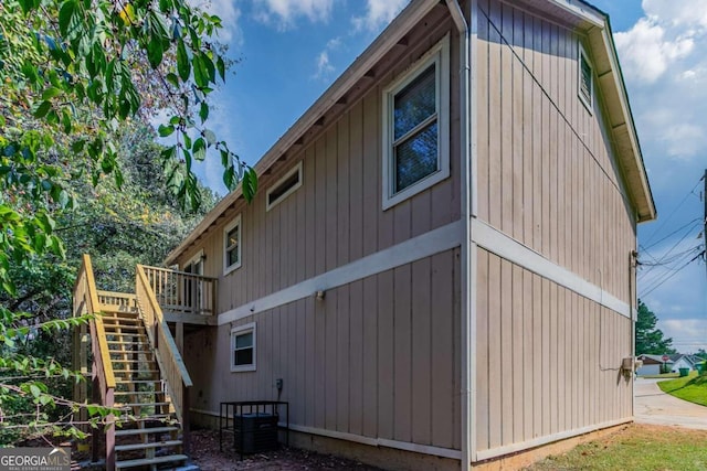 view of side of property featuring a deck