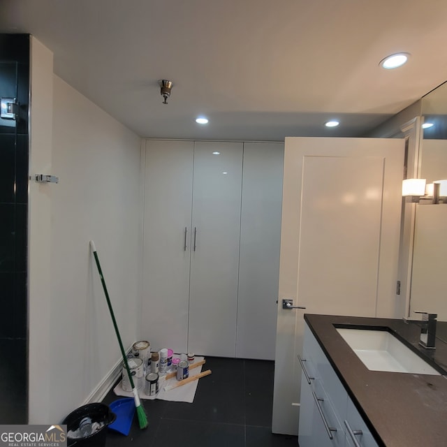 bathroom featuring vanity and tile patterned flooring