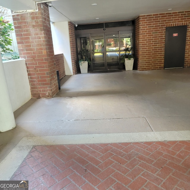 property entrance featuring french doors