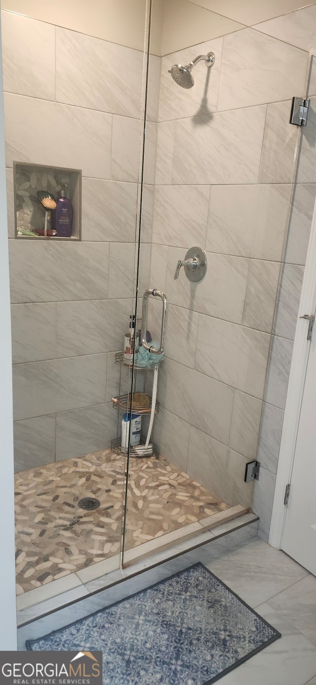 bathroom with an enclosed shower