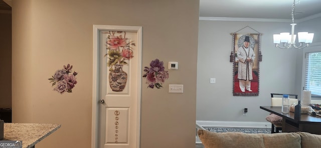 interior space with crown molding and an inviting chandelier