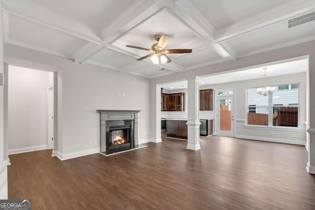 unfurnished living room with ceiling fan with notable chandelier, beamed ceiling, dark hardwood / wood-style floors, and coffered ceiling