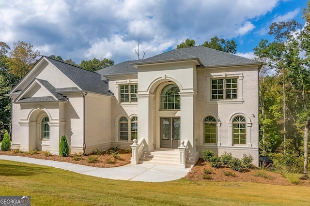 view of front of home with a front yard