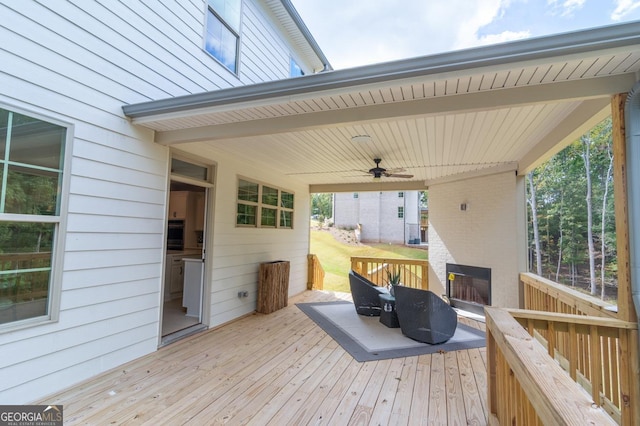 wooden deck with ceiling fan