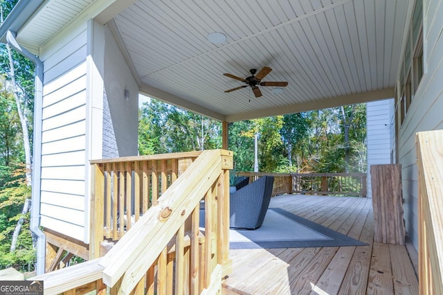 wooden deck with ceiling fan