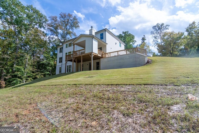 view of yard featuring a wooden deck