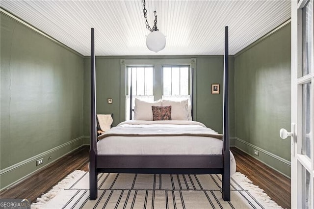 bedroom featuring wood-type flooring