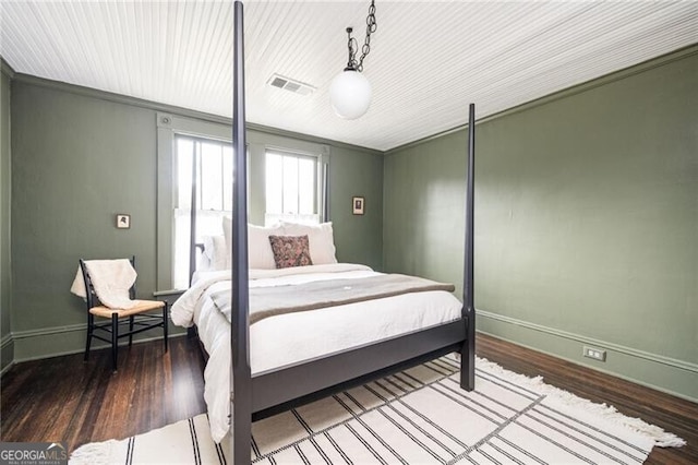 bedroom featuring hardwood / wood-style floors