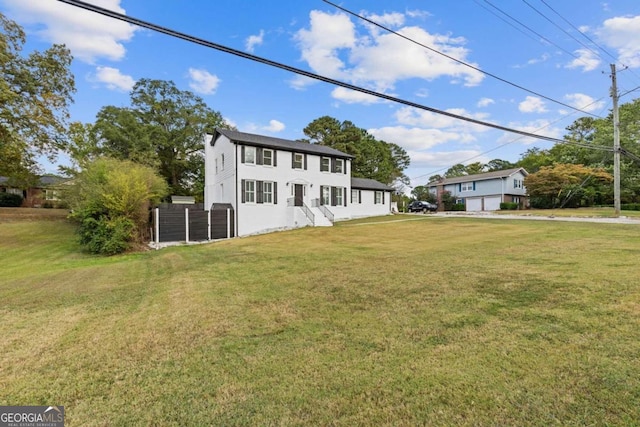 view of front facade featuring a front yard