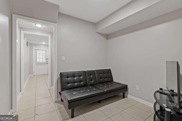 living area with light tile patterned floors