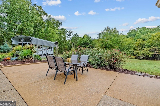 view of patio with a carport