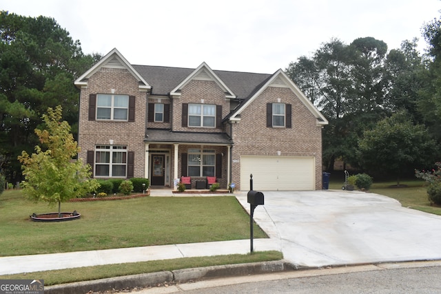 craftsman-style home with a garage and a front lawn