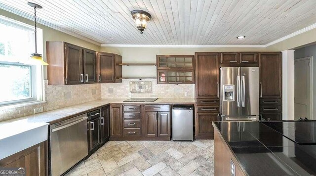 kitchen with pendant lighting, appliances with stainless steel finishes, and wooden ceiling