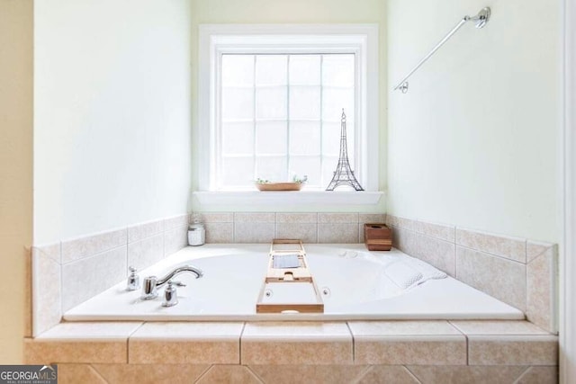 bathroom with tiled tub