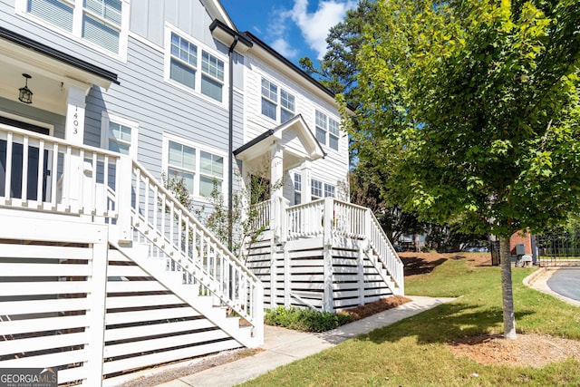 view of property exterior with a yard