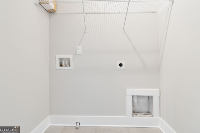 clothes washing area featuring hookup for a washing machine and hookup for an electric dryer