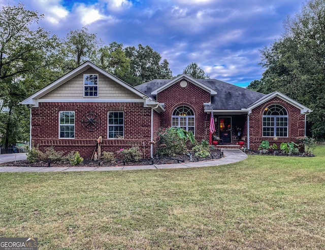 single story home with a front yard