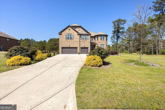 front facade featuring a garage and a front lawn