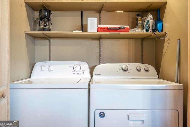 laundry room with washer and clothes dryer