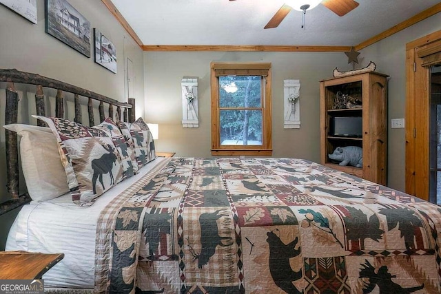 bedroom with a ceiling fan and crown molding