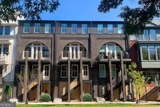 view of building exterior with central AC